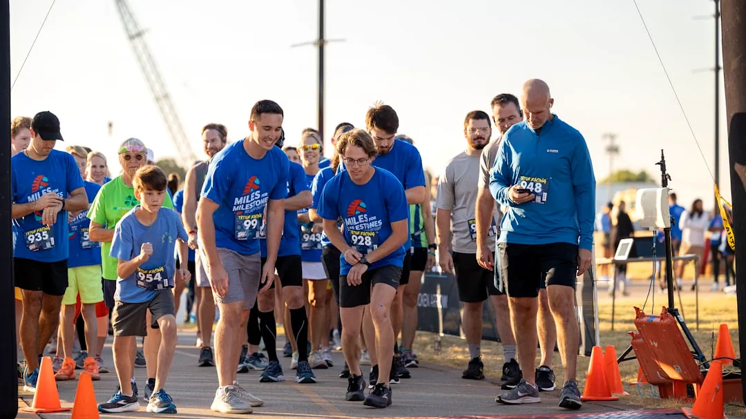 a group of people that are standing in the street