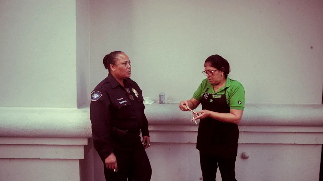 A man and a woman standing next to each other