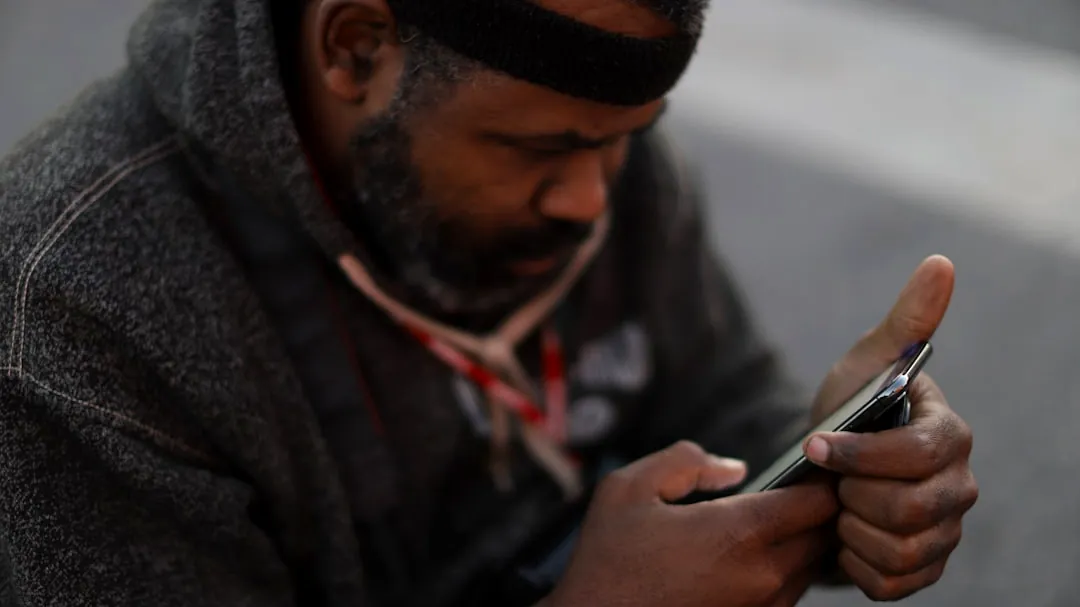 a man using a cell phone
