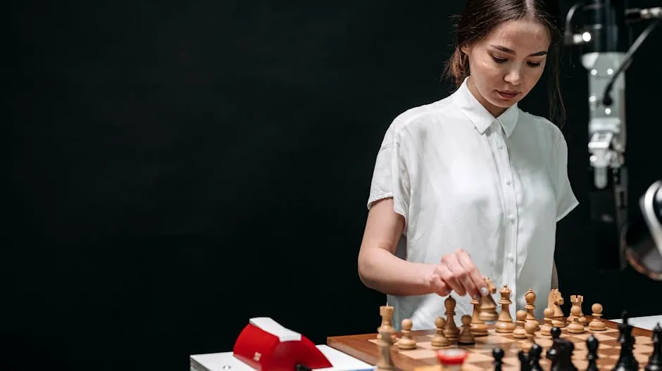 A woman plays chess against an articulated robot, symbolizing AI and human collaboration.