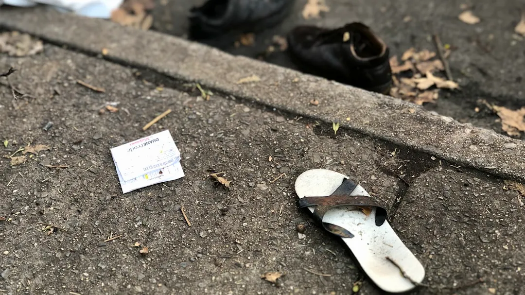 flip-flop on concrete pavement