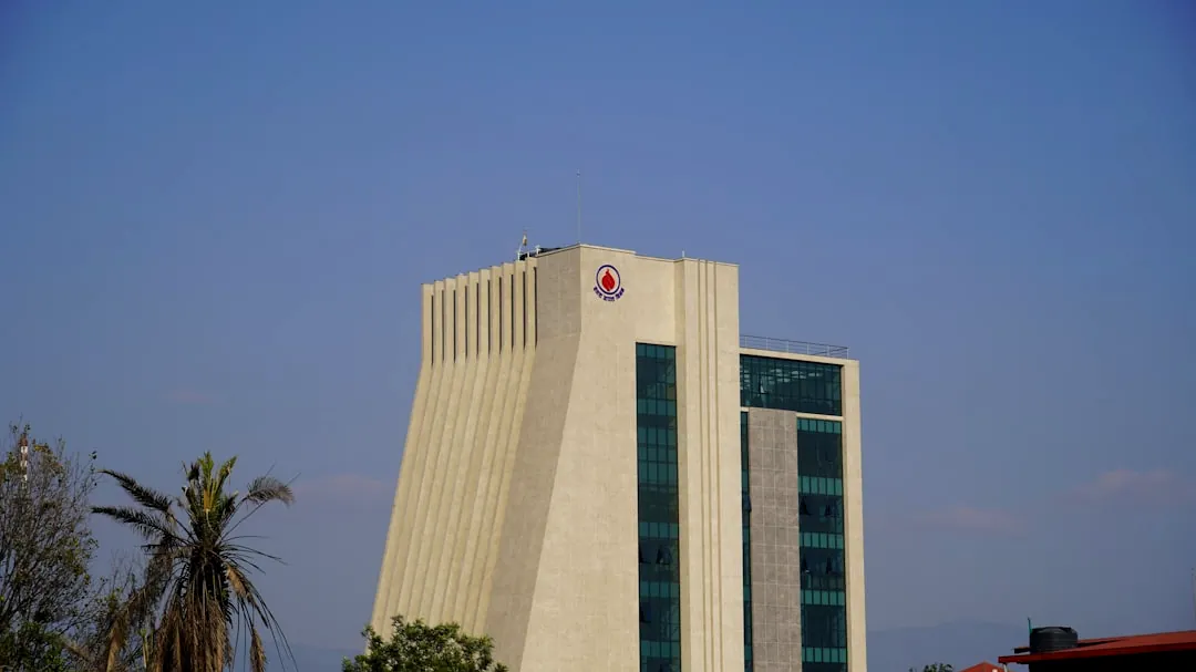 Modern building with geometric design against blue sky