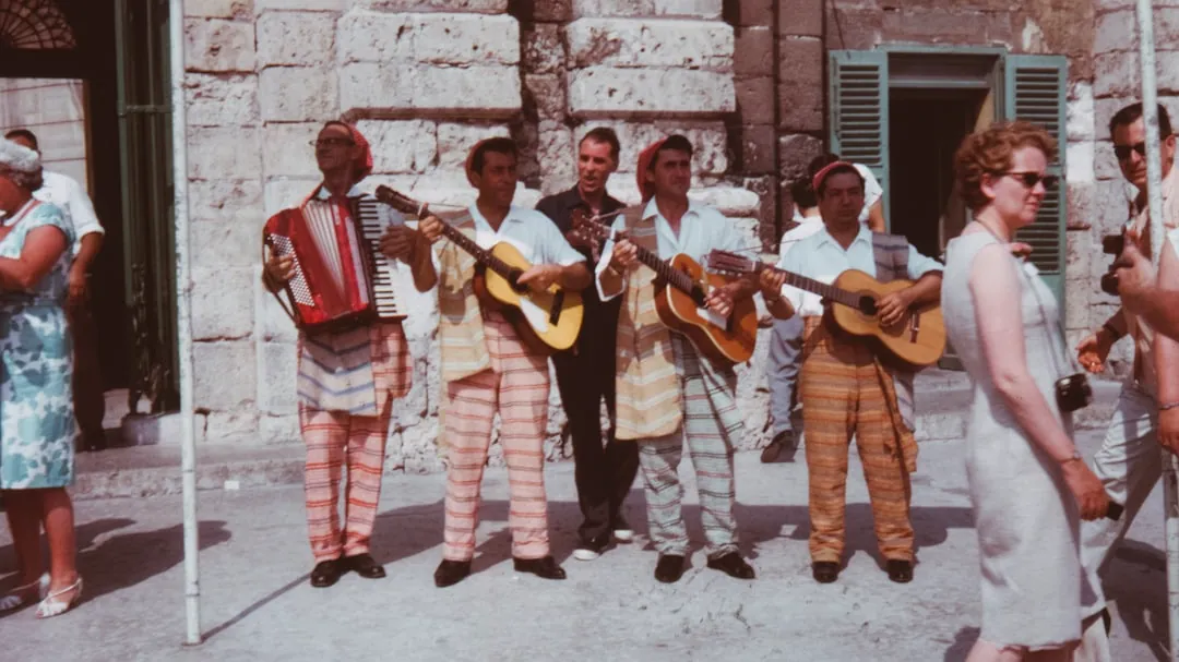 people playing guitar during daytime