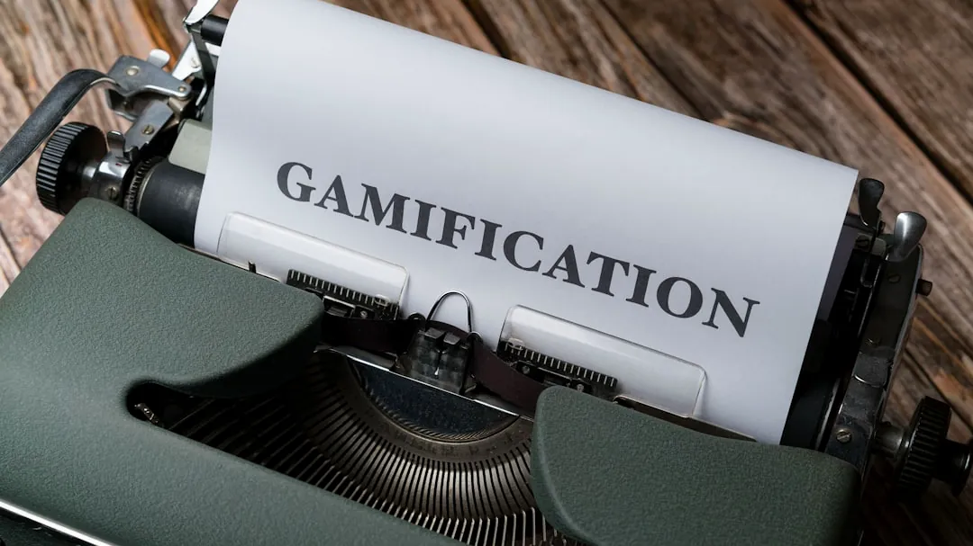 a close up of a typewriter with a paper that reads gamification