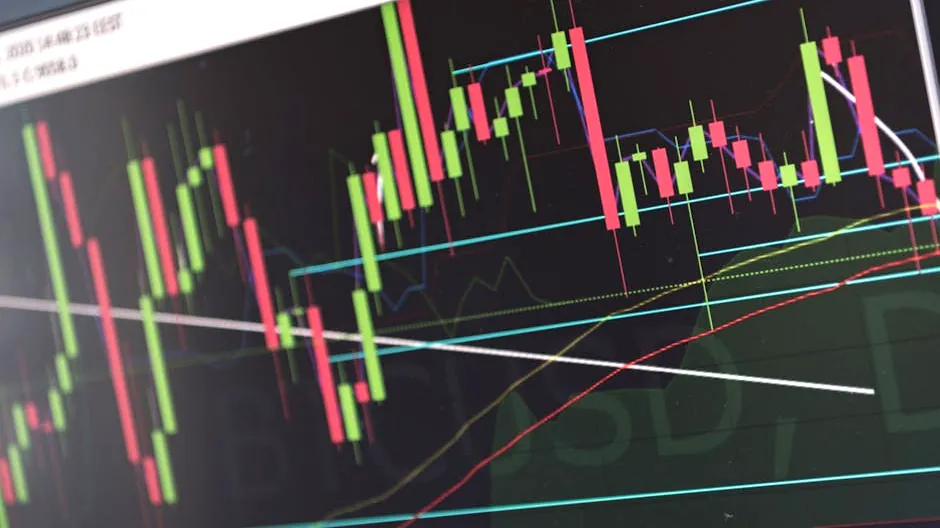 Close-up of vibrant stock market graphs displaying trading trends on a monitor, ideal for finance and cryptocurrency concepts.