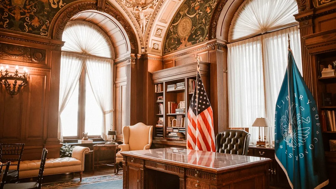 Elegant office with american flag and presidential desk.