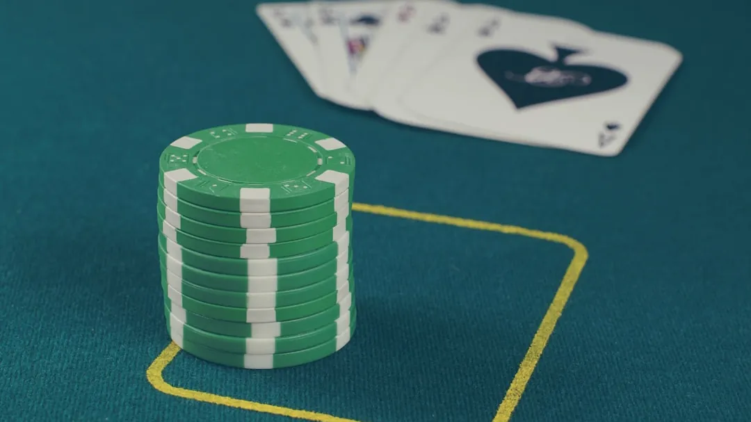 green poker chips on table